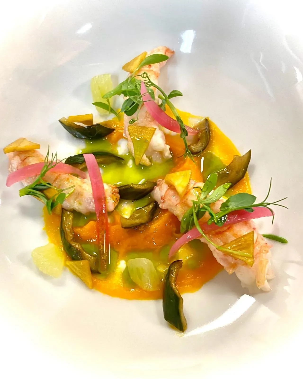 Shellfish, orange emulsion and pickled vegetables