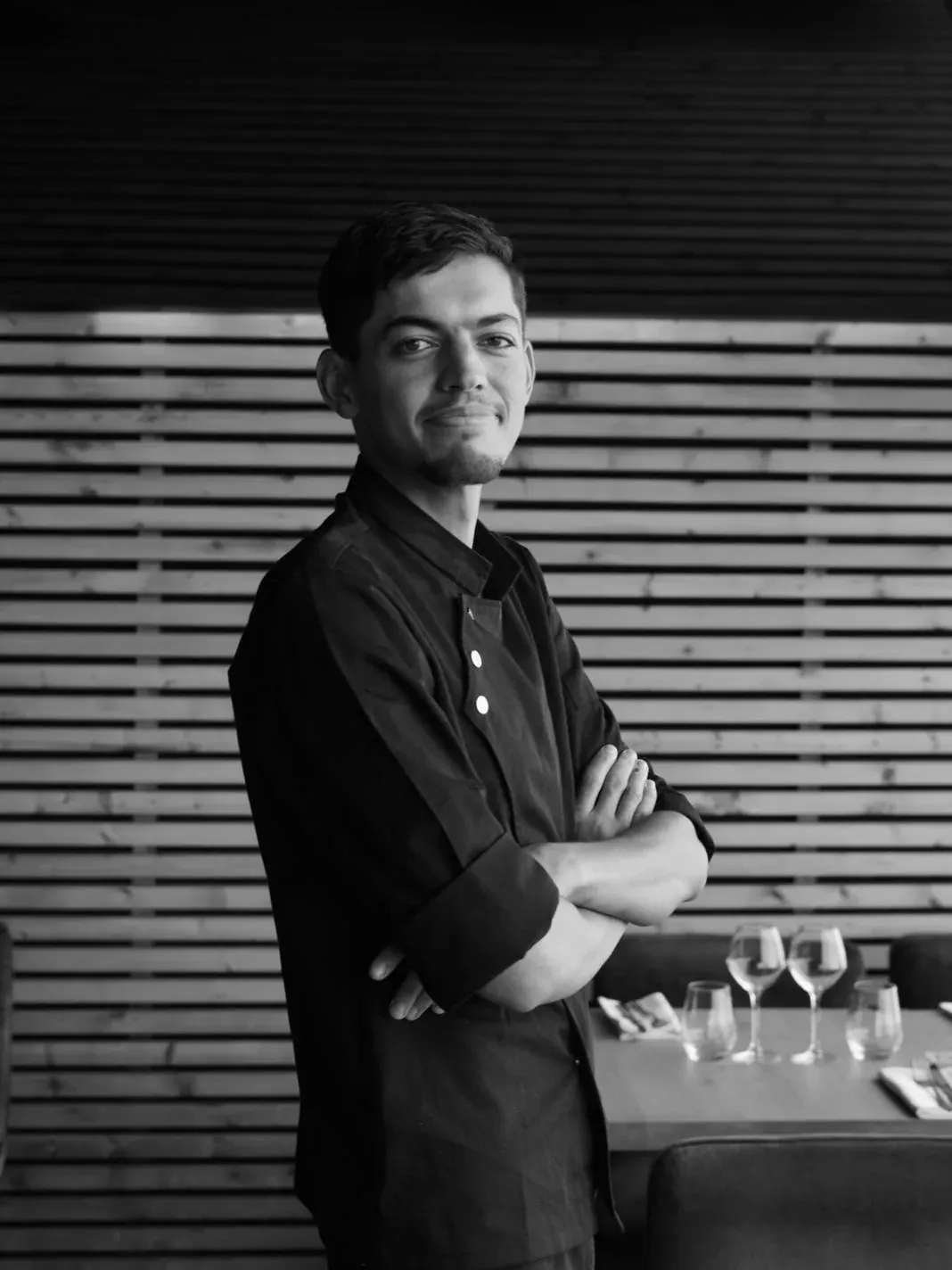 Brahim Saidi in chef's whites in the dining room