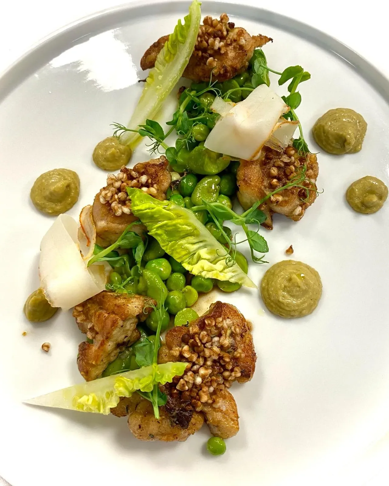 Crisp sweetbreads, baby gem and peas