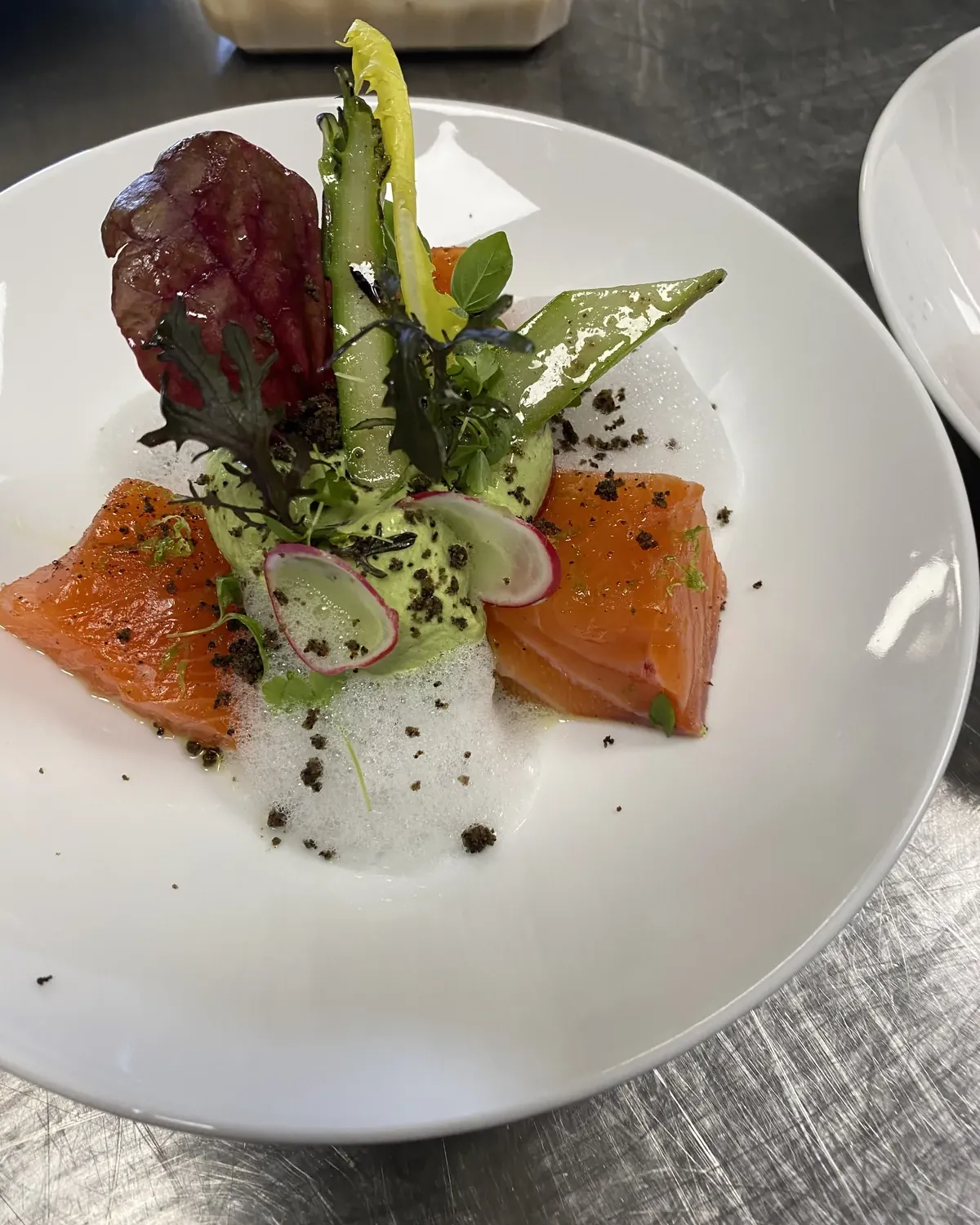Cured salmon, green asparagus, radish and foam